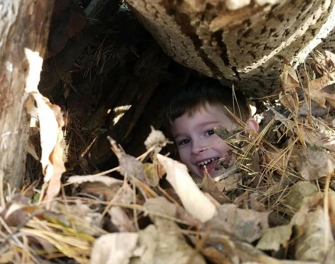 Boy in nature fort